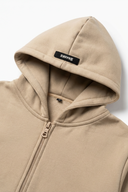 Foundation Zip Hoodie in CAFE MOCHA - Lifestyle Shot - ANANKE