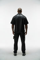 LEGEND FAUX LEATHER PLISSE SNAP CARGO PANT - BLACK